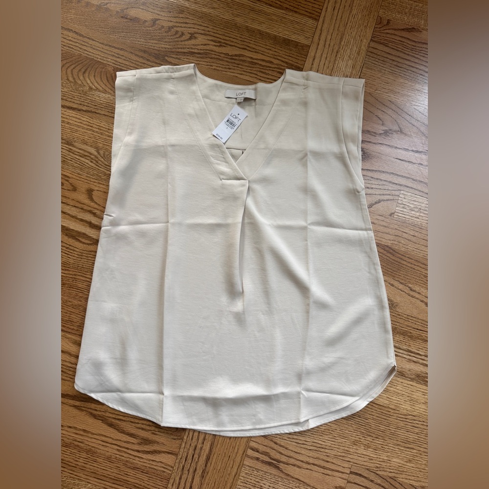 LOFT Ivory V-Neck Sleeveless Blouse. Size small. Brand New with Tags.